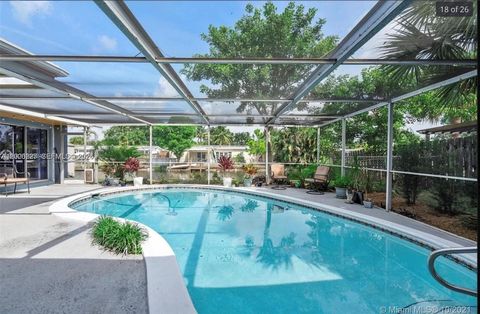 Tiny photo for 1891 NW 31st Ct, Oakland Park, FL 33309 (MLS # A12026827)