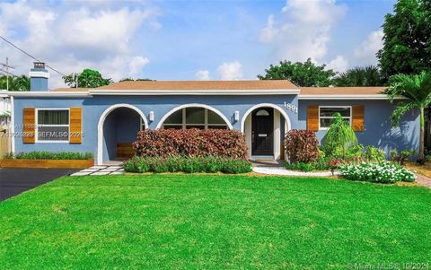 Photo of 1891 NW 31st Ct, Oakland Park, FL 33309 (MLS # A12026827)