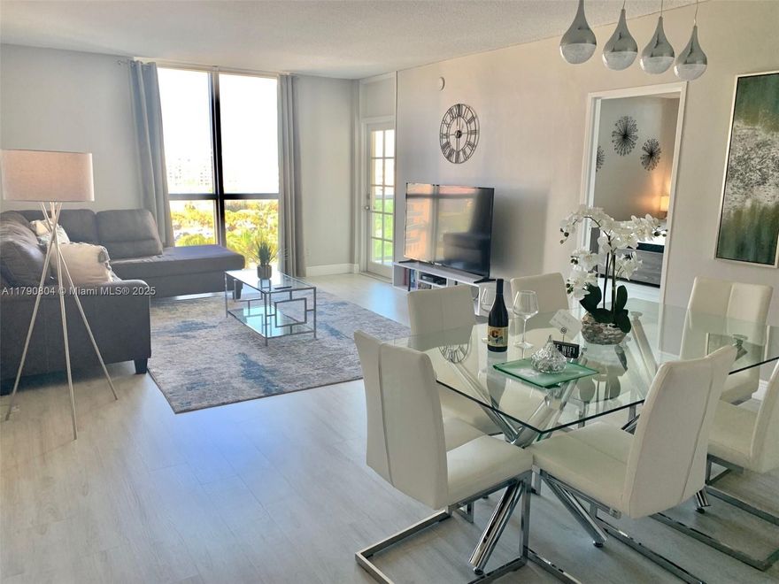 RUN, don't walk!! BARGAIN! Below market price for this large & bright 2/2 CORNER unit directly on the beach! Impeccable upgraded unit with NEW FLOORING, NEW FURNITURE, NEW PAINT, etc. Beautiful West view & some ocean view. Floor to ceiling windows in the living room. Balcony access from living room & master bedroom. Unit comes beautifully furnished & ready to use or rent! Resort style building w/2 pools, Tiki Hut, fitness center, restaurant, billiard room, business center, 24 hr security, garage self parking, valet, beach service, etc. LOW Maintenance fees include A/C, Wi-Fi, hot water, reserves, & cable. NO RENTAL RESTRICTIONS! Currently an AIRBNB unit generating income; booked for the next 3 months- buyer will receive instant income after closing. Call listing agent now!
