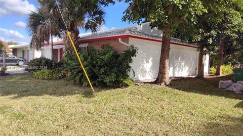 Photo of 7422 NW 70th Ave, Tamarac, FL 33321 (MLS # A11942422)