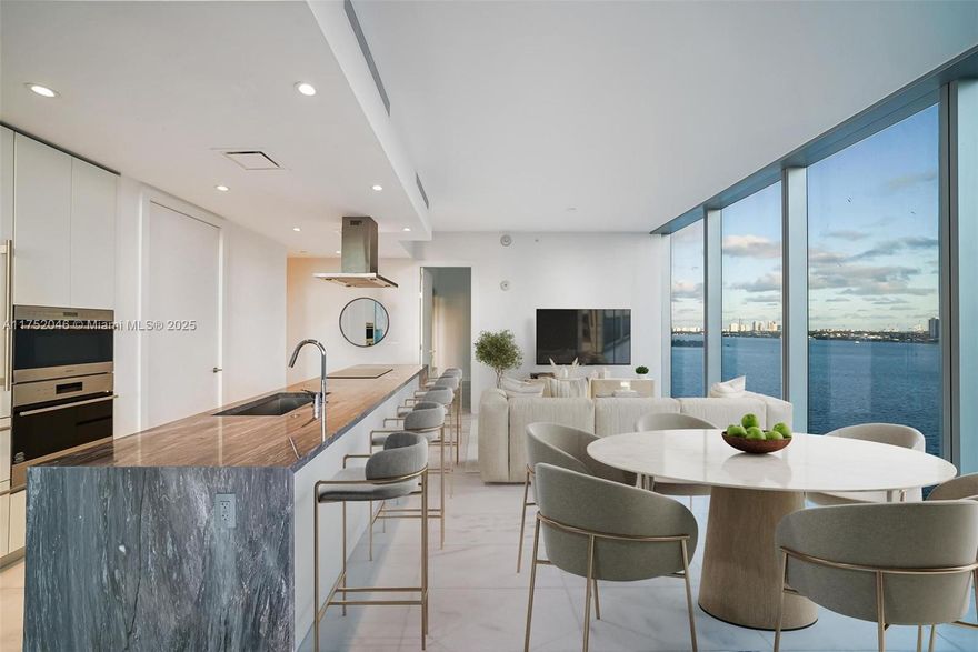 Experience the epitome of luxury living in one of Miami's most coveted waterfront addresses. This pristine, never lived in 2 bedroom, 2 bathroom corner residence offers views of the tranquil bay and vibrant city skyline, offering picture perfect views from sunrise to sunset. Featuring a spacious split floor plan, Wolf and Sub-Zero appliances, marble floors, open concept kitchen and living area and an expansive balcony perfect for entertaining. This residence is bright, airy and bathed in natural light. Ideally located with a perfect walkability score, minutes from Miami's best dining and shopping. Residents enjoy access to resort style amenities, including three pools, fitness center, wellness spa + sauna, tennis court, theater, business center and more.