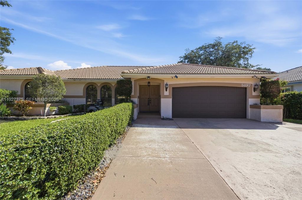 Photo of 5197 NW 58th Ter, Coral Springs, FL 33067 (MLS # A11927375)