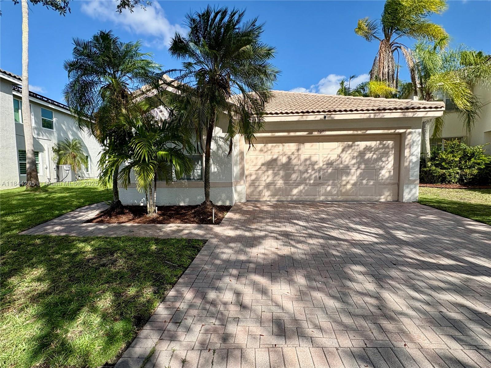 Fully renovated interior in 2023, this 3-bed, 2-bath home with a dedicated office space features porcelain tile flooring throughout, quartz countertops, and stainless steel KitchenAid appliances, including a wine cellar and combo microwave/wall oven. Property includes custom blinds, a spacious 2-car garage and newly installed A/C in 2024. Enjoy tranquil lake views from the backyard, complete with a mature mango tree. Located in the gated Silver Shores community—don’t miss this turnkey gem!