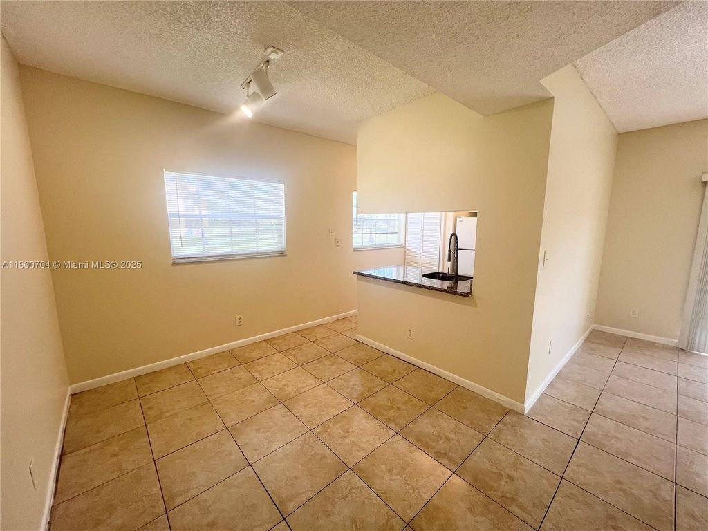 Photo of 731 Cypress Ln #I8, Deerfield Beach, FL 33064 (MLS # A11900704)