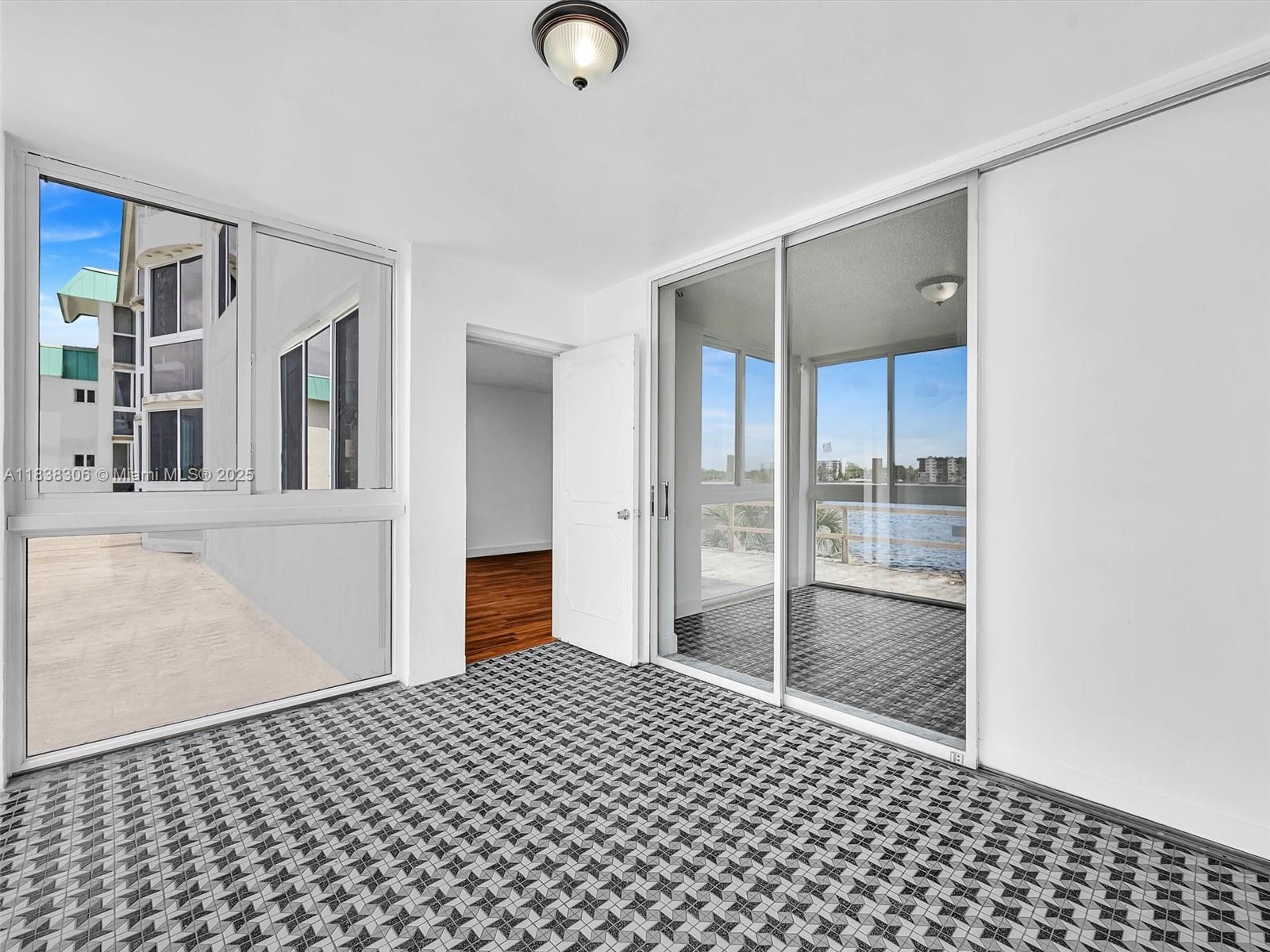 Great opportunity to own this apartment with a stunning direct lake views. Located in a newly upgraded building With Brand New Impact Windows, New Elevators, And NewExterior Paint.Great for new buyers to own their dream home! and enjoy the Spacious layout of this 1bedroom plus den and 2 full bathrooms with lots of natural light. Special assessment is already paid in full.Call L/A for showings.