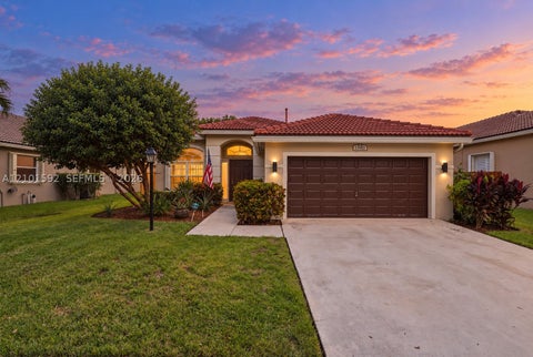 Photo of 13182 NW 19th St, Pembroke Pines, FL 33028 (MLS # A12101592)