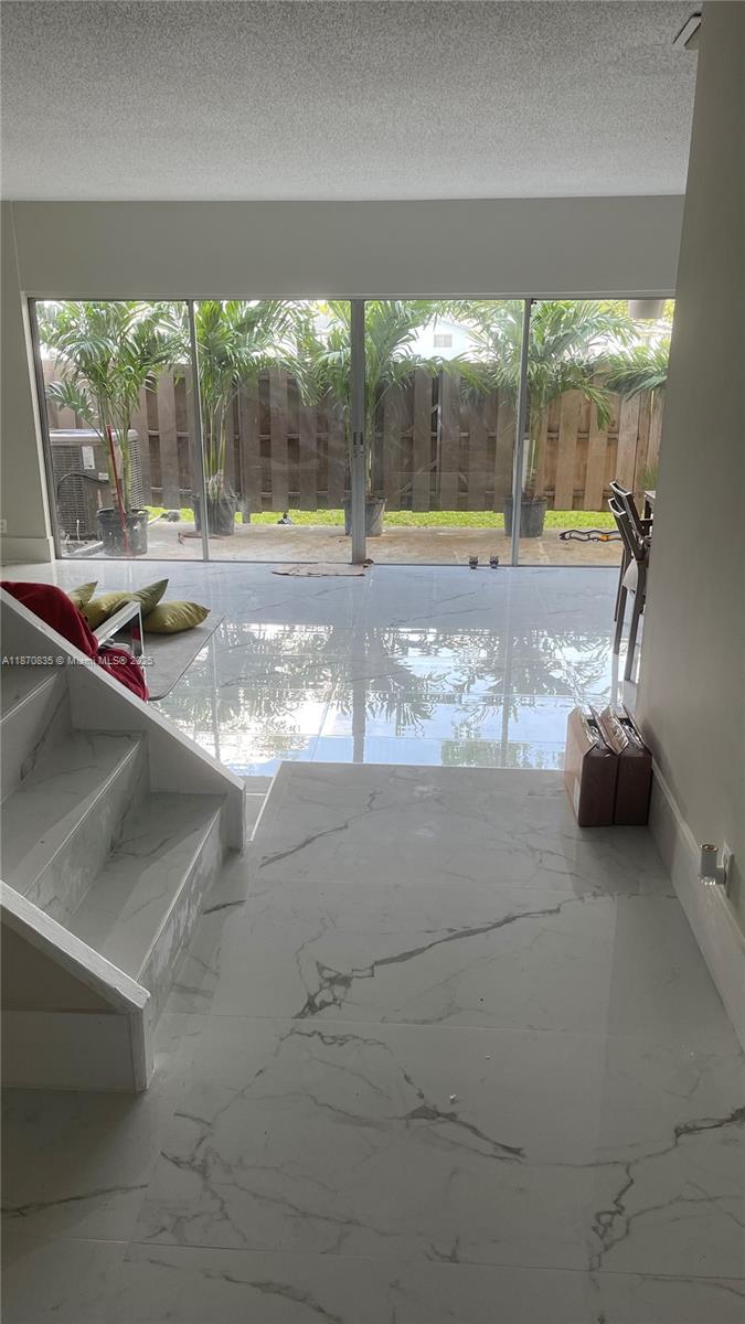 TOWNHOUSES AT JACARANDA - Residential