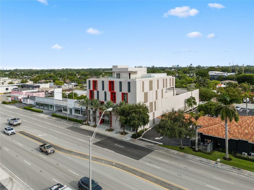 Class "A" new construction building, situated on the Bird Rd Corridor just west of the Palmetto Expressway, offers 45,829sqft of versatile space for retail, office, or medical use. The 4-story structure features 3,021sqft of retail space on the 1st floor and 12,808sqft of office space on the second through 4 floors. It includes a 24,127sqft parking area with a 43-space garage, expandable to 80 spots with valet, a 1,500 sqft covered canopy on the roof, 60k+ daily traffic count, ensuring maximum exposure, multiple side-seen faces for signage 100x50 ft of exposure and XL stainless finish elevators for stretchers or medical equipment. Suitable for a range of uses such as primary care, urgent care, imaging, labs, social services, or as a Corporate Business Center. Seller financing available.