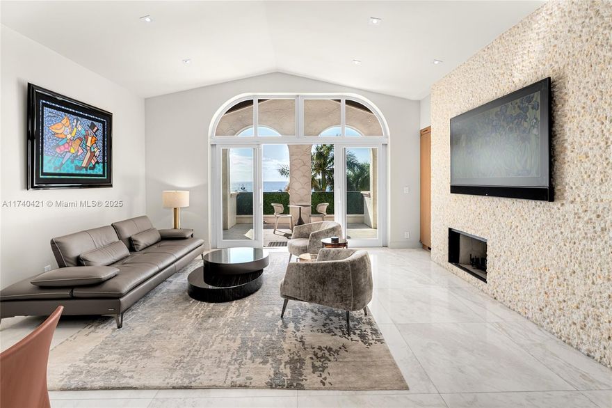 This stunning 2BR, 2.5BA unit in Bayside Village, spans 1,912 SF of contemporary luxury. The south-facing unit boasts high ceilings, fine marble floors, hurricane impact glass & wide plank oak floors in bedrooms. Offers a gated entry terrace & expansive Oceanside terrace w/comfortable seating areas & direct Atlantic Ocean & Fisher Island Marina views. Large open dining & living area w/high-pitched ceiling, high-end Macintosh surround sound system, a stone accent wall, custom floor-to-ceiling windows/doors opening to the terrace. Chef’s kitchen sports Wolf & Sub-Zero appliances, granite finishes, and adjacent office space. The principal suite features terrace access, water views, a spa bathroom w/marble floors, walk-in closet & sunken spa tub. The 2nd BR is spacious w/ensuite bath.