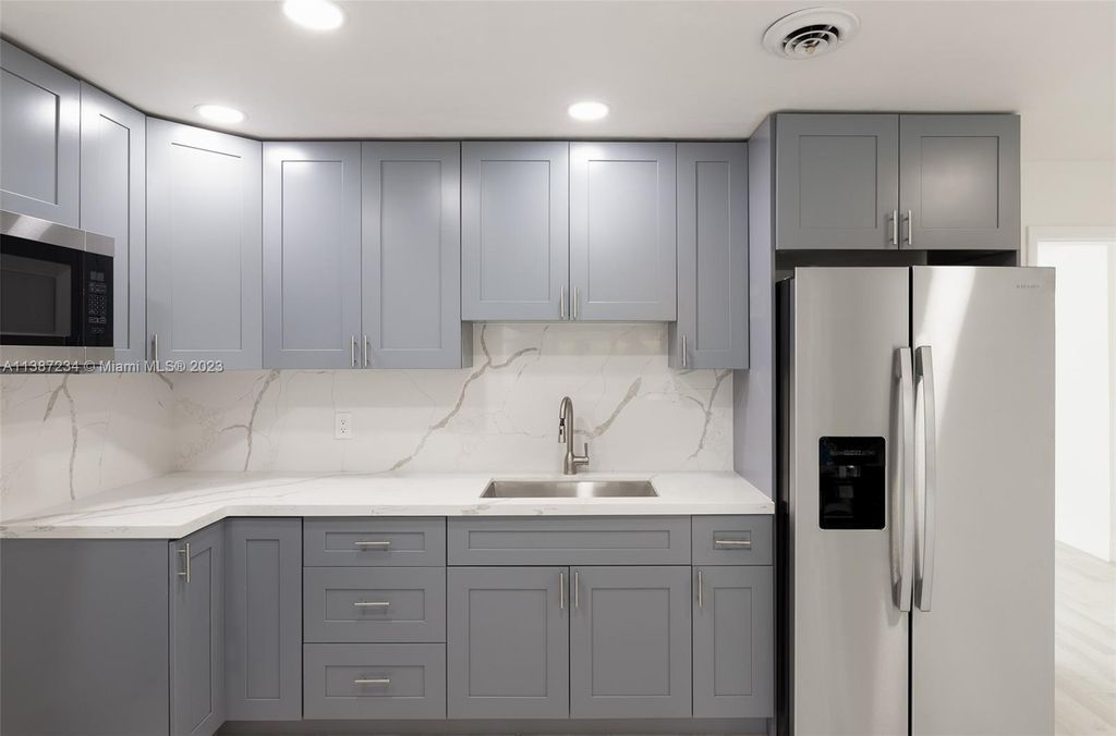 Photo of 124 NE Entrada Ave, Port Saint Lucie, FL 34952 (MLS # A11387234)