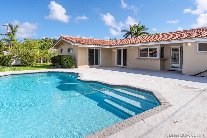 MRS. CLEAN LIVES HERE! IMMACULATE, TOTALLY RENOVATED, FRESHLY PAINTED, AND READY FOR THE NEW BUYER. MANY UPGRADES INCLUDE THE CUSTOM WOOD KITCHEN WITH GRANITE COUNTER AND BREAKFAST BAR. BOTH BATHS ARE NEW. ALL WINDOWS AND DOORS ARE IMPACT GLASS. 4TH BEDROOM HAS MURPHY BED. GAS COOKING AND GAS WATER HEATER. FAMILY ROOM PLUS OFFICE/PLAYROOM. BEAUTIFUL FENCED IN GARDEN WITH FRUIT TREES AND CUSTOM IRRIGATED VEGETABLE GARDEN TO LOVE! OVER-SIZED LOT...OVER-SIZED POOL...PRICED FOR IMMEDIATE SALE.