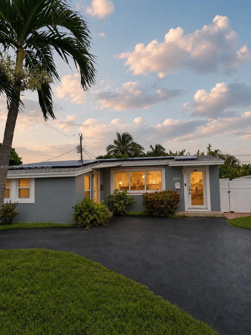 Photo of 5651 NE 9th Ave, Oakland Park, FL 33334 (MLS # A12027847)