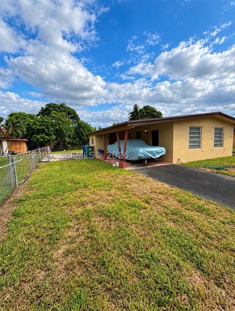 Photo of 3271 NW 182nd St, Miami Gardens, FL 33056 (MLS # A12099390)