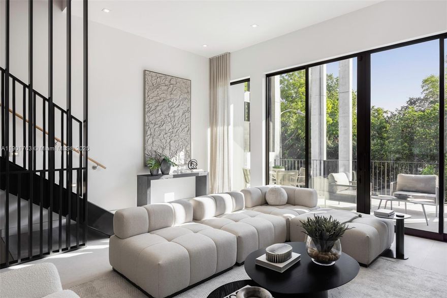 Award-winning contemporary residence in The Roads Townhomes featuring a distinctive formed-concrete façade. A dramatic open stairwell, volume ceilings and skylight define the airy interior. The sprawling second-floor living space with 12’ ceiling flows to a giant, glass-walled terrace. The chef’s kitchen offers Italian cabinetry, Wolf-Sub Zero appliances, porcelain slab surfaces and 10’-wide island for prep and counter dining. Spa-style master bath includes a freestanding tub, dual vanities and glass-walled shower. Additional highlights: multiple balconies, sound-insulated, private entry courtyard, Mondrian-inspired privacy screens, full-size 2-car garage and concrete construction with impact glass.