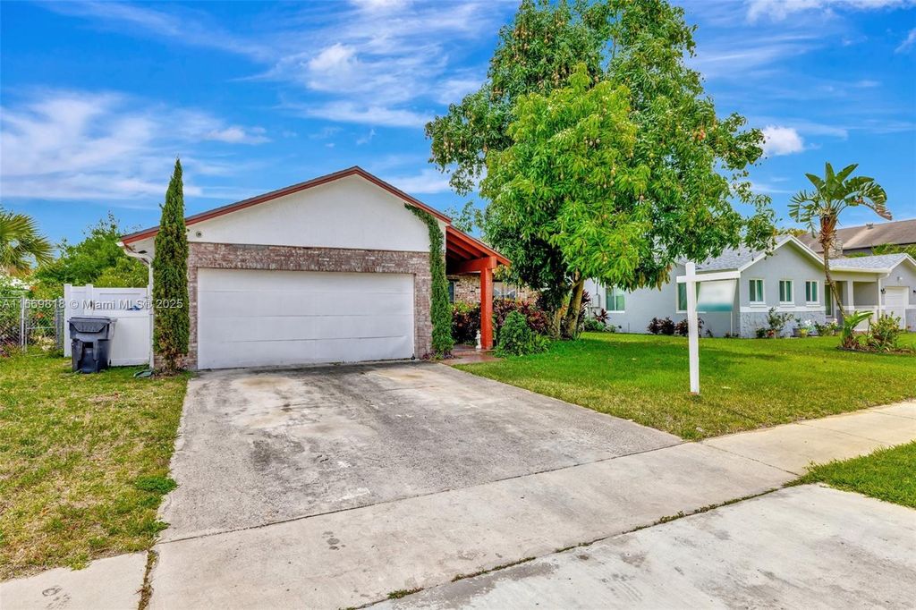 Photo of 1905 SW 87th Ave, North Lauderdale, FL 33068 (MLS # A11669818)