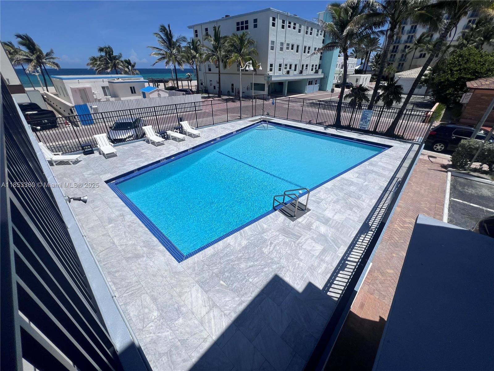 Updated Hollywood Beach Studio – Steps to the Ocean | No Rental Restrictions. Exceptional opportunity just one block from the Beach! This updated studio is the perfect vacation retreat or income-producing property, with no rental restrictions—allowing for daily, weekly, or monthly rentals. The building has completed its 40-year certification and offers resort-style amenities, including a pool and sundeck with stunning ocean views. Inside, the unit is move-in ready and features modern furnishings and contemporary finishes throughout. Whether you're an investor seeking a turnkey short-term rental or a buyer searching for a low-maintenance beachside escape, this studio checks all the boxes. Don’t miss your chance to own one of Hollywood Beach’s most desirable locations!