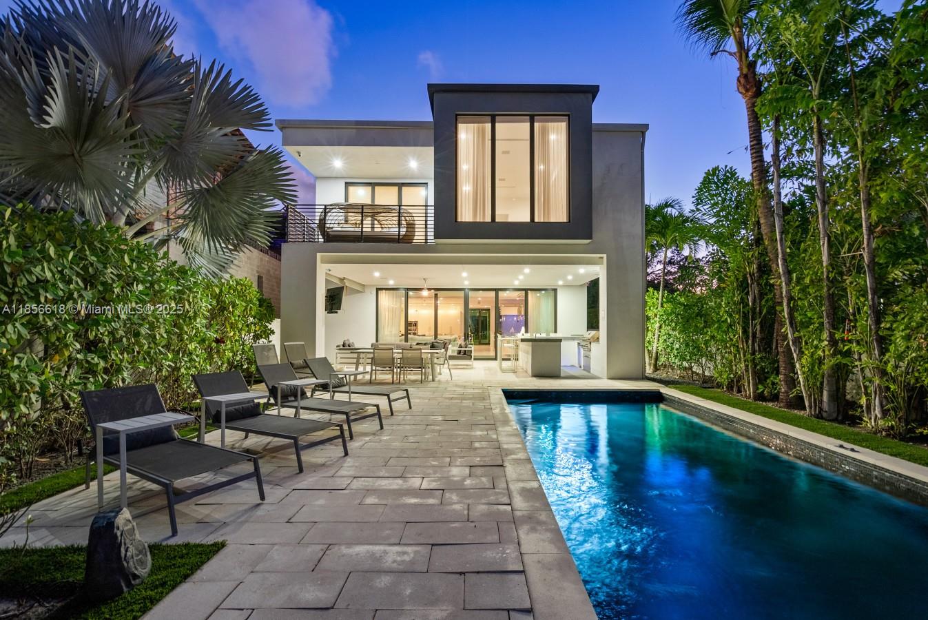 Ultra-modern waterfront villa in the coveted Beverly Heights neighborhood, just steps from Las Olas’ finest dining and shopping. This 5-bed, 5-bath residence offers over 6,000 sq ft of custom luxury living, featuring a grand master suite, octopus aquarium, elevator, and vast entertainment spaces. Enjoy an infinity pool surrounded by a lush tropical Zen garden, outdoor firepit, covered wet bar, and 40' deep-water dock with ocean access and no fixed bridges. Short-term rentals welcome—by the week, month, or year. Call listing agent for exclusive showings.
