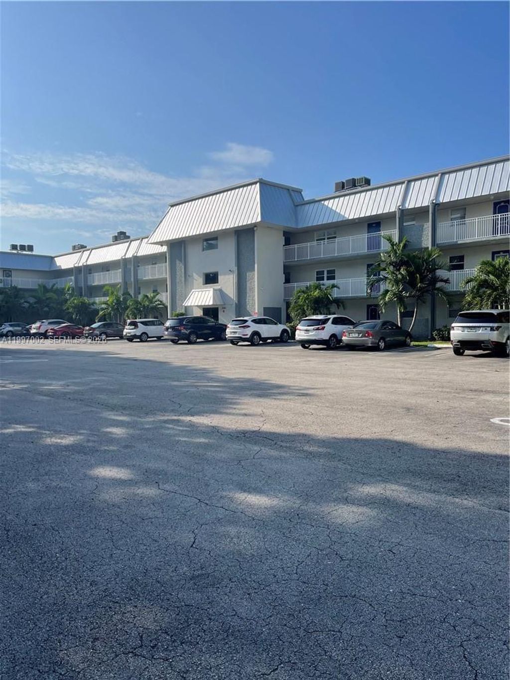 Photo of 2980 Riverside Dr #125-3, Coral Springs, FL 33065 (MLS # A11997002)