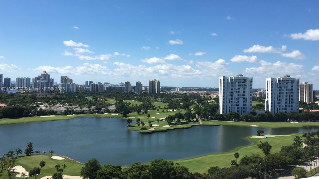 Nestled in a serene and welcoming building, this charming 2-bedroom to 2-bathroom residence offers stunning views of the Turnberry Golf Course. Situated on the prestigious Country Club Drive, right in the heart of Aventura, this home combines comfort with luxury. The newly installed hurricane sliding doors ensure safety and tranquility, while the split floor plan enhances privacy and space, making it ideal for both relaxation and entertaining. Currently rented for $2,850 a month until December 2025, it presents an excellent investment opportunity while you enjoy the best of Florida living in this delightful retreat!