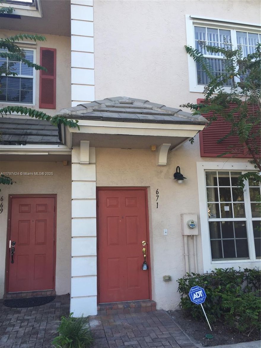Beautiful 2-Bed, 2-Bath Townhouse, This elegant townhouse features gorgeous wood floors and an open floor plan that creates a seamless and inviting living space. Enjoy access to a refreshing swimming pool and the convenience of an assigned parking space. Located near major highways, hospitals, restaurants, and shopping centers, this home offers the perfect blend of comfort and accessibility. Plus, benefit from a brand-new roof with new tiles installed in February 2025!