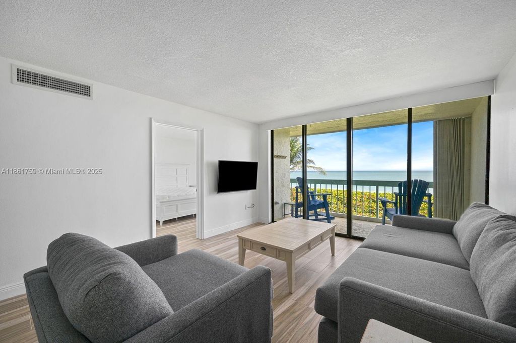 Photo of 9940 S Ocean Dr #202, Jensen Beach, FL 34957 (MLS # A11861759)