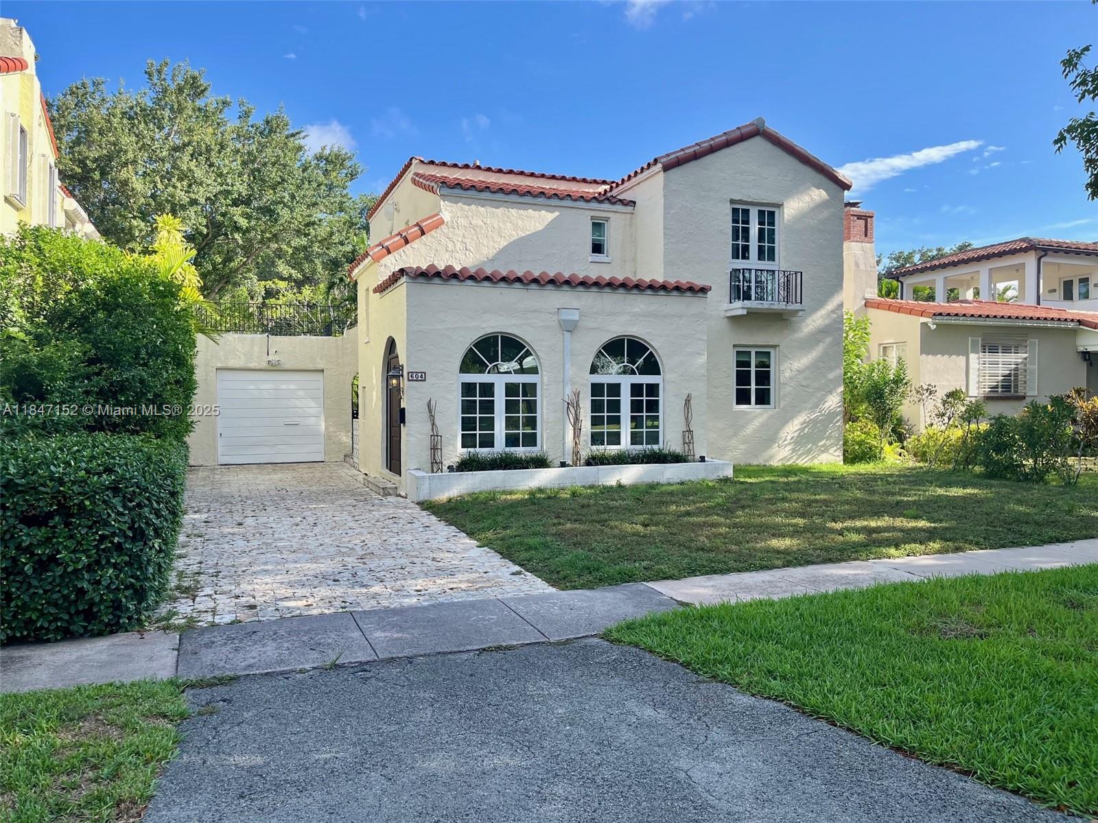 Brimming with charm, this Spanish-style Coral Gables rental home with 3 bedrooms plus casita/studio with murphy bed and full bath offers timeless appeal with thoughtful updates. The 2-story, 2,024 SF main house offers a beautiful sunroom entrance, hardwood floors, 10’ ceilings, impact windows, and a sunlit living room with fireplace. A formal dining room and upgraded kitchen with stainless steel appliances add to the home’s warmth and functionality. The detached studio with 1 bathroom provides privacy for guests or work-from-home needs. Outside, enjoy a lush, private backyard on a 5,000 SF lot, with a heated pool equipped with jacuzzi jets for relaxation. Unbeatable location near the Granada Golf Course and downtown Coral Gables.