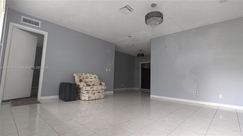 Photo of 2621 SW Natura Ave, Deerfield Beach, FL 33441 (MLS # A11681625)