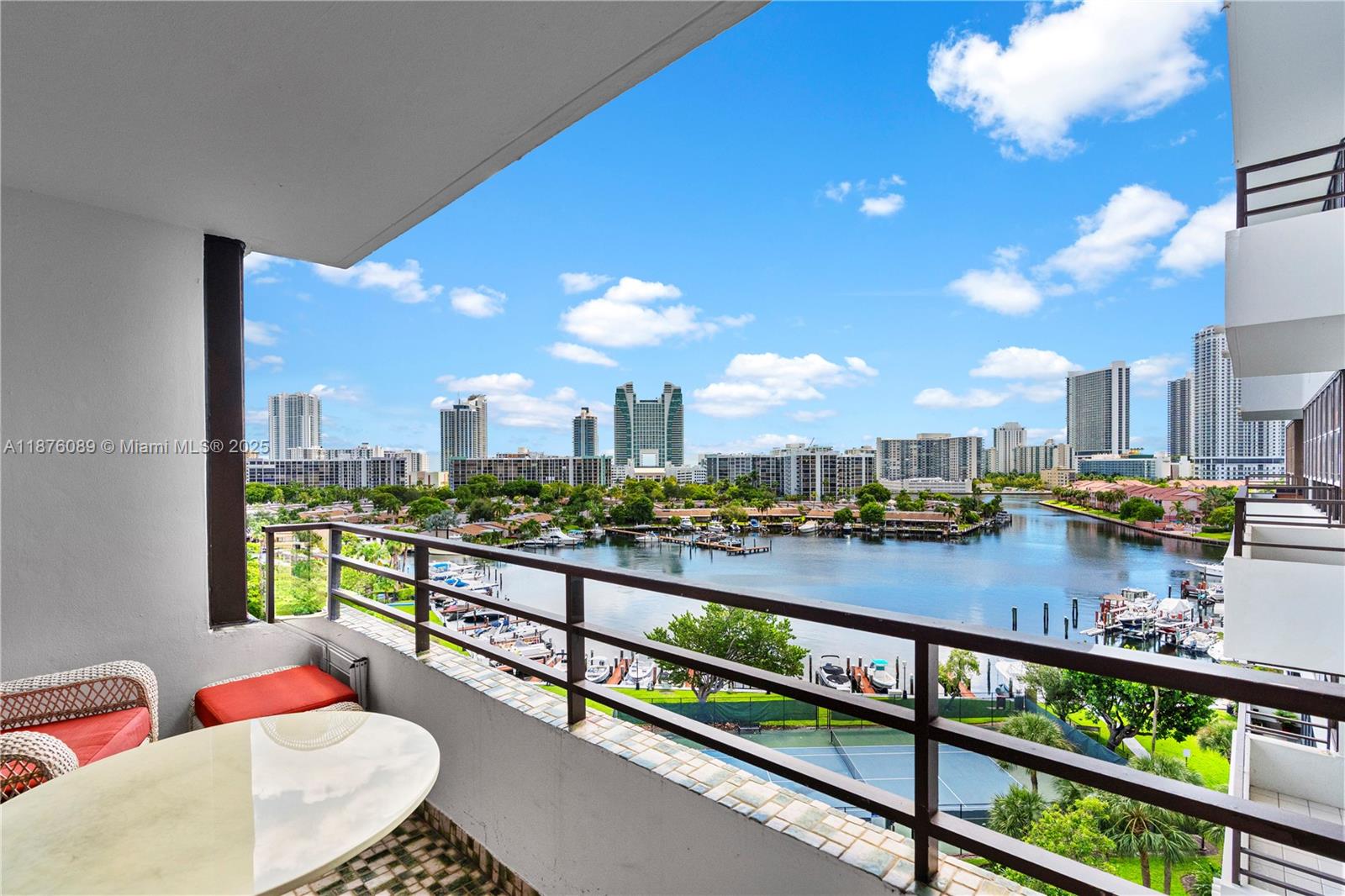 Welcome to one of only 8 unique 1/1.5 units in the entire building of Olympus Condominium. It offers a generous 1,140 sq. ft. of living space, an open-concept layout that flows seamlessly, maximizing the living space and providing an airy, bright atmosphere. The large bedroom serves as a private retreat. Updated kitchen and baths, no popcorn ceiling, +storage unit. Enjoy breathtaking, panoramic views from your private balcony. 18 acres of Lush landscaping, Multi-million dollar Clubhouse, State-of-the-art Gym, Sauna, 2 Heated pools, 4 Tennis courts, BBQ & Self-car wash. Walk or take the Free Shuttle to Shops & Dining. Minutes away from the Beach. This unit is a rare find & ready to move in! Exceptional tenants pay $2400, can stay or leave. Schedule a Private Showing before this GEM is gone!