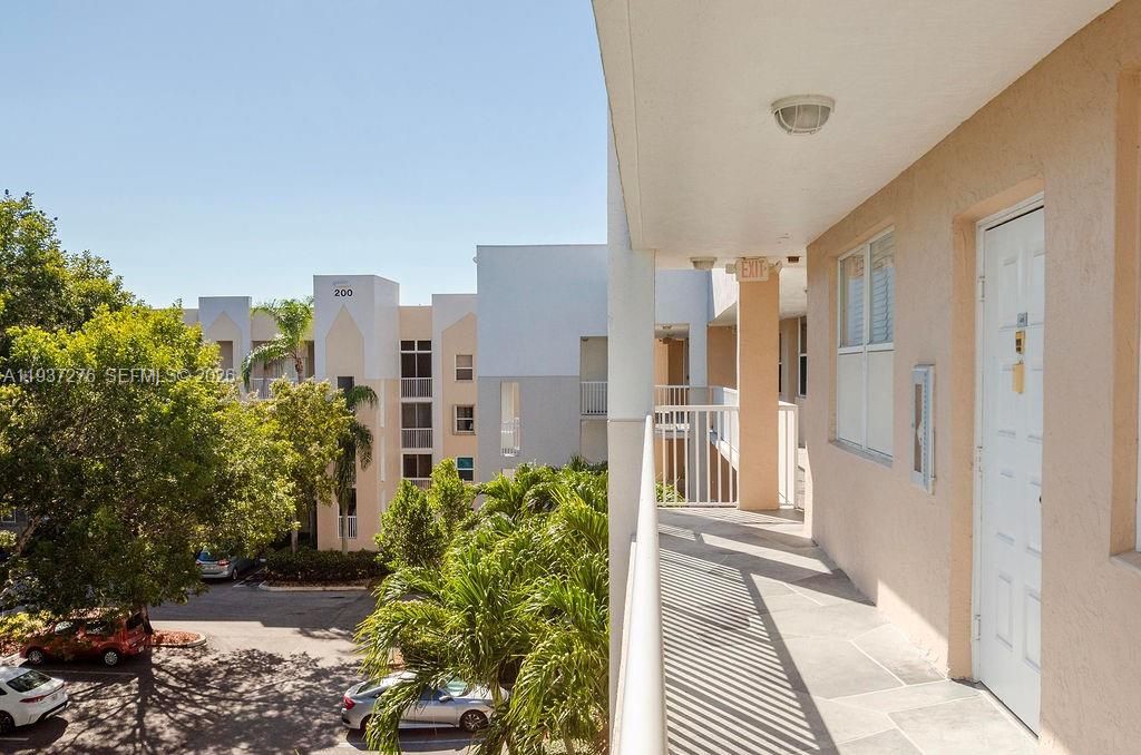 Photo of 2601 N Nob Hill Rd #402, Sunrise, FL 33322 (MLS # A11937276)