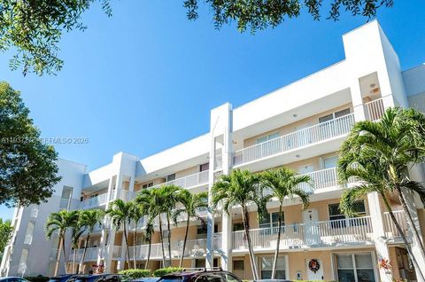 Photo of 2601 N Nob Hill Rd #402, Sunrise, FL 33322 (MLS # A11937276)