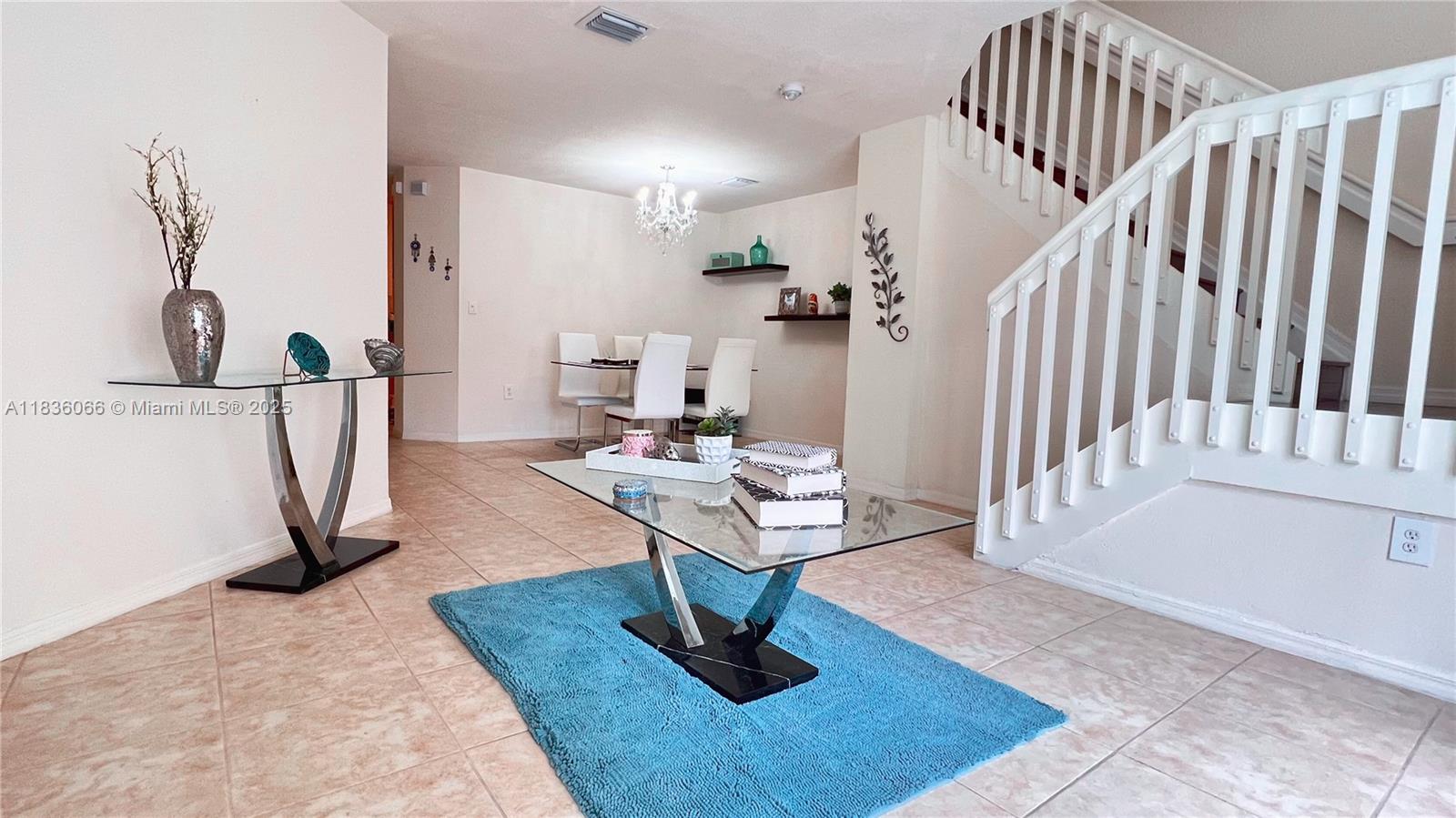 Beautiful three-bedroom, 2.5 bathroom townhouse, corner unit in the gated Melrose Point Community in Monarch Lakes. One of the largest units in the community, offering a spacious family room, a formal living room, and a dining room. Full-sized washer and dryer included. Upstairs features three bedrooms, including an oversized master suite with a private balcony. Enjoy resort-style amenities with a stunning clubhouse, pool, and fitness center. Includes Comcast TV and Internet. Conveniently located near shops, restaurants, grocery stores, and a neighborhood library. It’s close to top-rated schools, with easy access to major highways like I-75, the Florida Turnpike, and I-595. Live in the heart of Monarch Lakes where comfort meets convenience- Don't miss this one!!!