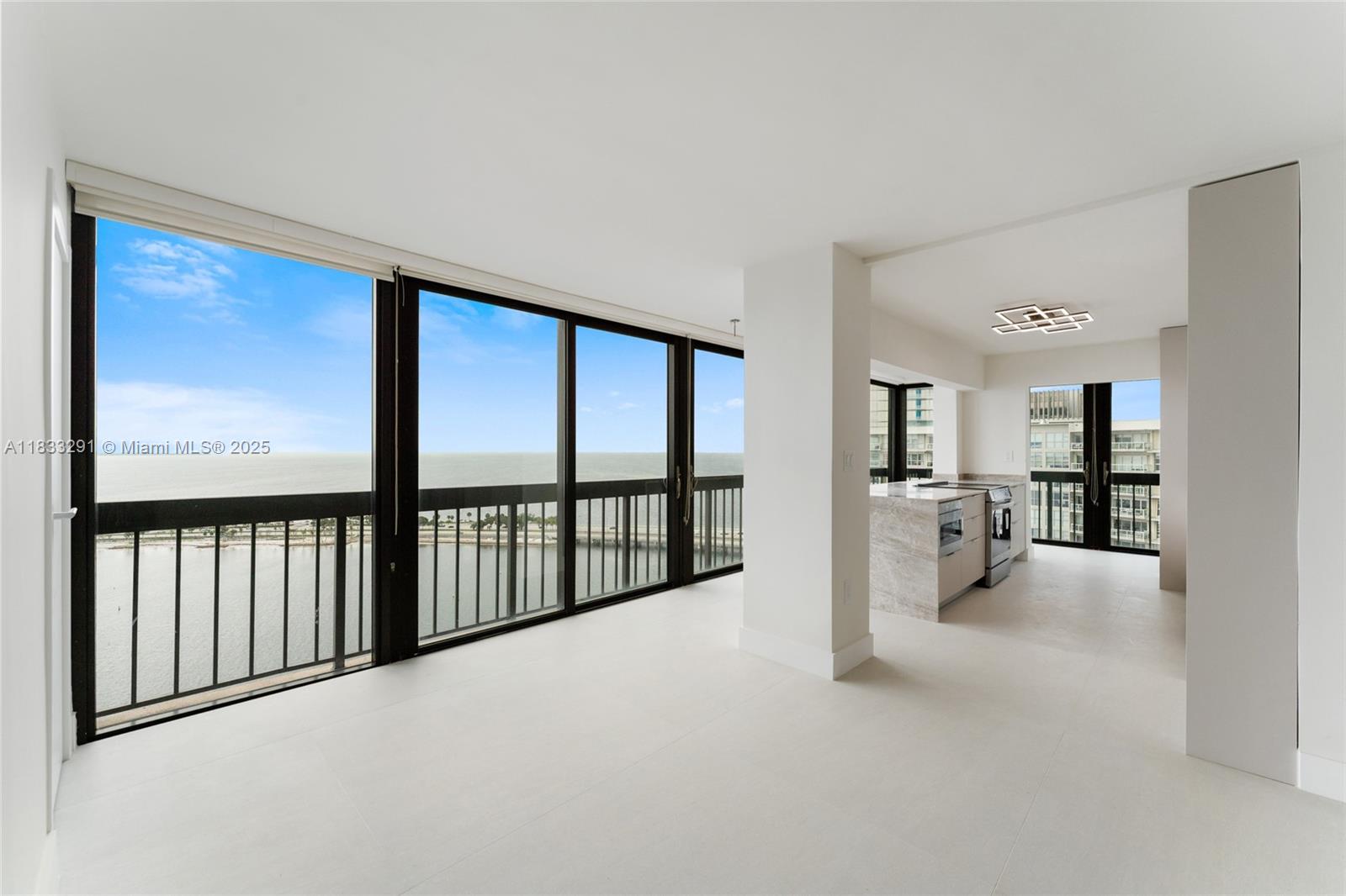 JUST REMODELED SPECTACULAR two bedroom - two bathroom corner "02" line at Brickell Bay Club with spectacular bay views. Beautiful modern ceramic floors, brand new kitchen and bathrooms. Clean and well-kept! Amenities include tennis courts, a game room, a heated pool, 24-hour security, an exercise room, a convenience store, and valet parking for visitors. BEST LINE IN THE BUILDING. Easy to show, see broker remarks.