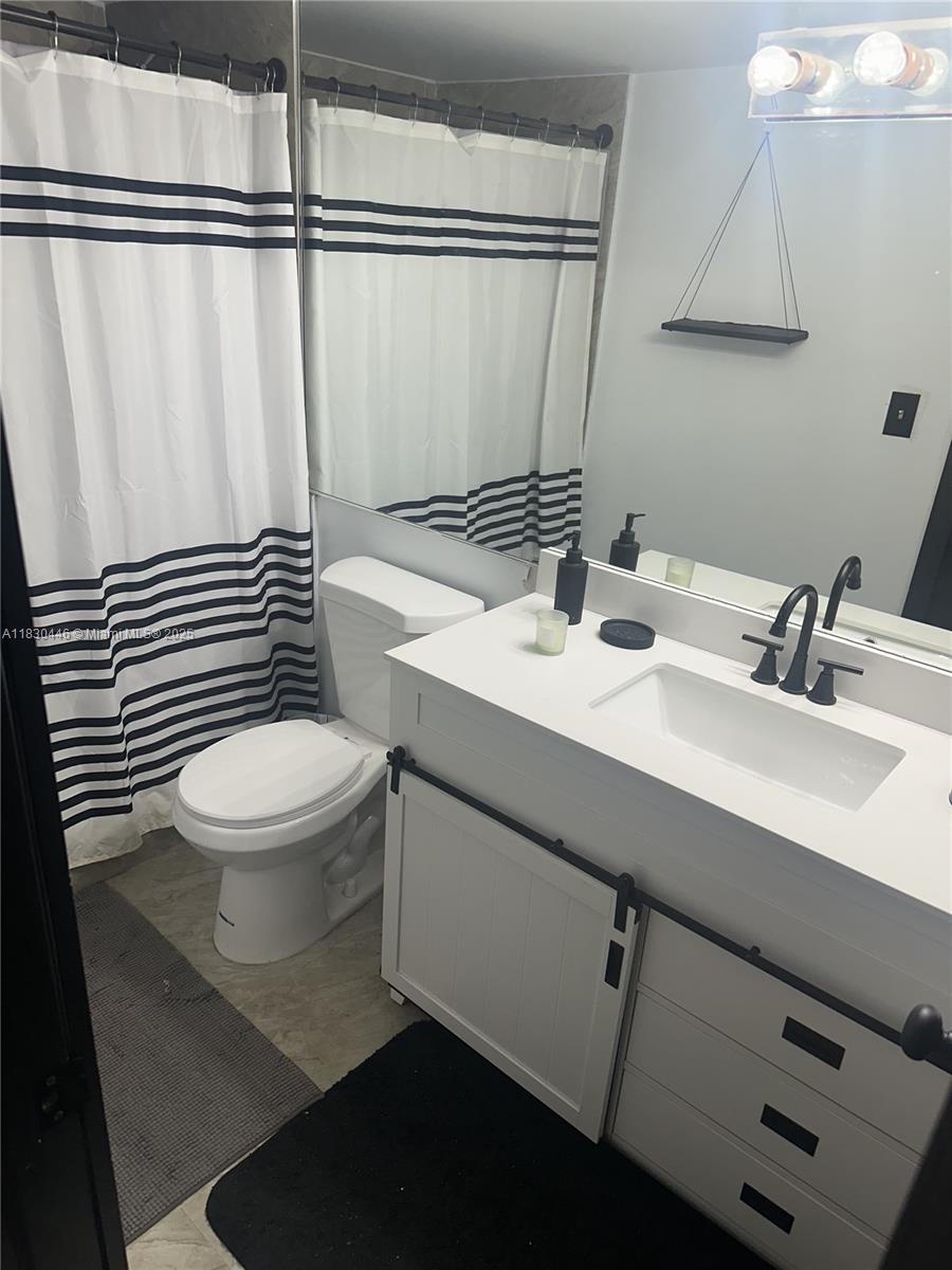Location Location Location! Lowest HOA around Welcome to this beautifully updated first-floor condo in the heart of Miami ! This spacious unit features impact doors , new updated flooring and baseboards , and a remodeled kitchen and bathrooms , offering both style and functionality . Located in a well-maintained building , this condo provides a comfortable and secure living environment. The area is conveniently close to shopping centers, dining options ,major highways , A + schools and just a short drive from Aventura Mall and the beaches . Don't miss this opportunity to own a move-in-ready home in a prime location !