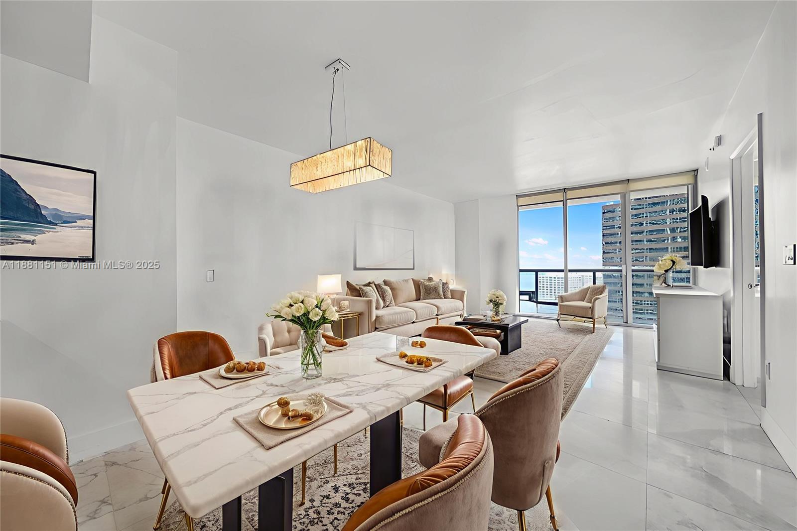 2-bedroom, 1-bathroom condo on the 22nd floor with sweeping views of Biscayne Bay and Brickell Avenue. Interior features include marble floors, Italian kitchen cabinetry, premium Wolf appliances, and expansive floor-to-ceiling windows that bring in natural light. Offered fully furnished and ready to generate income from day one. Icon Miami residents enjoy unmatched amenities with a 2-acre pool deck featuring three infinity-edge pools including an Olympic-sized pool, five on-site restaurants such as Cipriani and Icon Café, full-service spa and fitness center at the W Hotel, plus 24-hour valet and concierge. Perfectly located in the heart of Brickell, steps to shops, dining, and nightlife