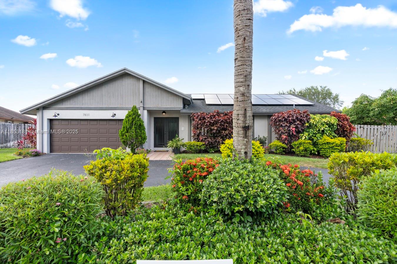 Plantation, FL home - ready to move in! This stunning 4-bedroom, 2.5-bathroom property blends luxury, comfort, and security with lake views and exceptional features. The spacious open-concept living area w/ high ceilings includes a chef's kitchen with stainless steel appliances and ample counter space. The main suite offers serene lake views, a walk-in closet, and a luxurious en-suite bathroom with dual vanities and a soaking tub. Enjoy the resort-style pool and spa, perfect for outdoor relaxation. With a solar power system, battery backup, and hurricane impact windows, this home is efficient and secure. Located near Plantation Walk, shopping, and entertainment, it offers privacy and convenience. Schedule your tour today! Rarely available Lakefront property in Marcano Estates - No HOA!!