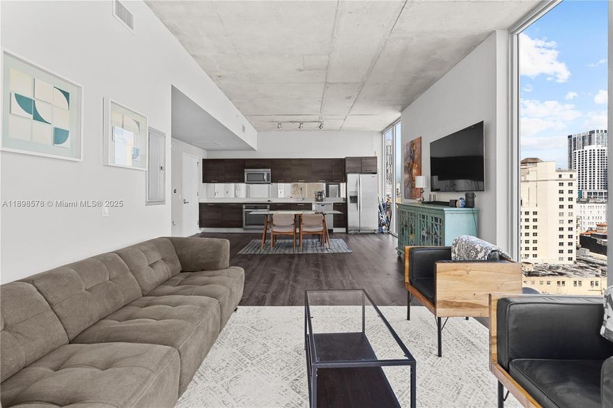 Originally a two-bedroom, this corner residence has been reimagined into a spacious loft-style layout, blending openness with flexibility. The den offers the perfect setup for a home office, guest space, or creative studio, ideal for today’s dynamic lifestyle. Located just steps from Brickell, Bayside, & the Miami River District, CENTRO places you in the heart of it all. The building features a full suite of premium amenities, including a rooftop pool with sweeping city views, a state-of-the-art fitness center, business lounge, and 24/7 front desk service all in a pet-friendly environment. Ideal for investors or part-time residents seeking both lifestyle and ROI, CENTRO allows monthly rentals up to 12 times per year, perfect for seasonal stays, mid-term cash flow, or extended personal use.