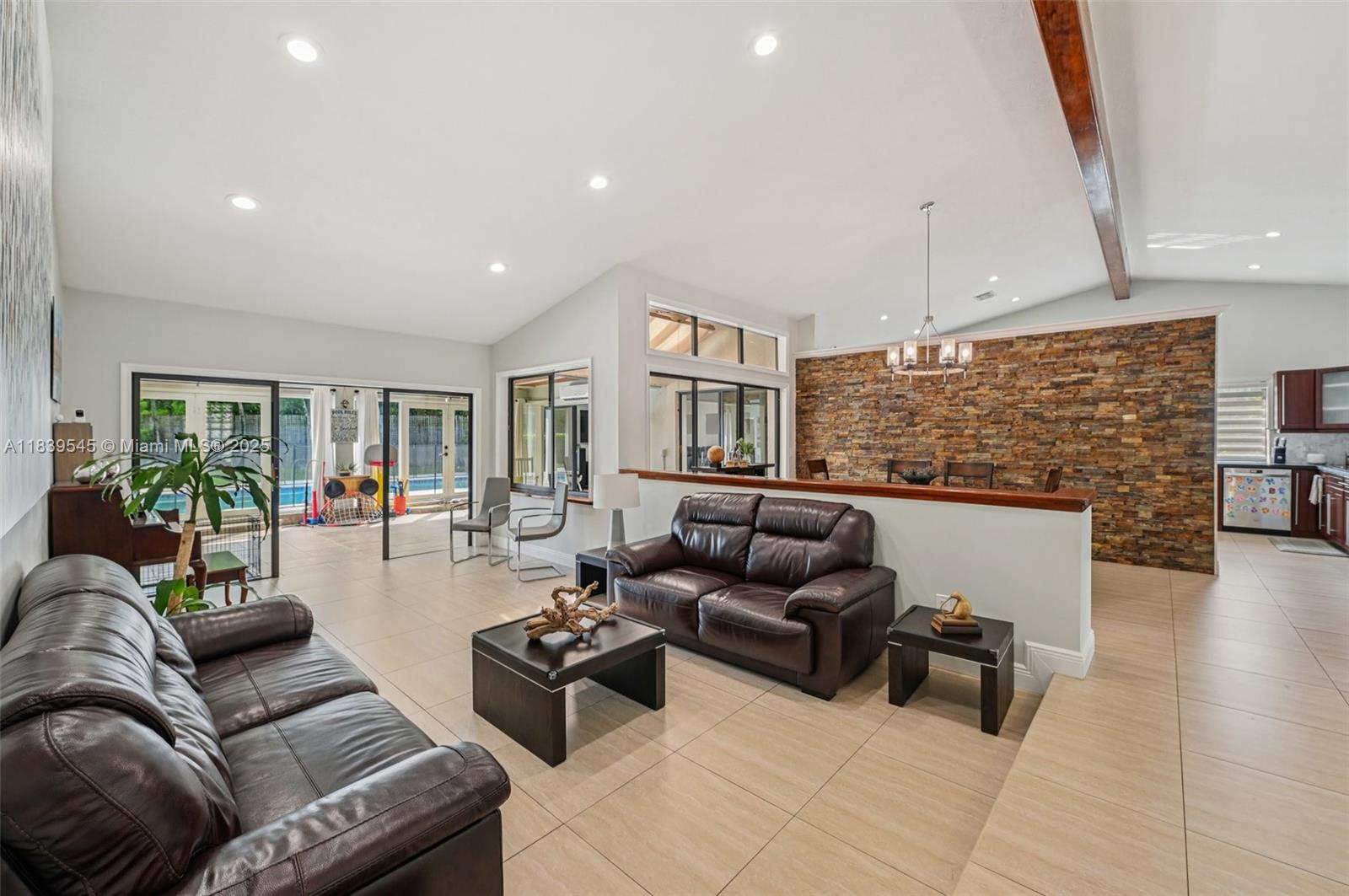 This beautifully maintained 4 bed, 3 bath home boasts over 3,200 sq ft under A/C in a peaceful, family-friendly neighborhood. Vaulted ceilings, ceramic floors, and a bright sunroom/playroom with atrium and skylight create a welcoming interior. Impact patio doors open to a private backyard oasis with lush greenery, a sparkling pool, and tons of room for entertaining or relaxing in your own tropical escape with two gazebos to complement the pool area. The durable metal roof has the elegant look of barrel tile and is built to last. Closets feature built in shelfing.
A spacious layout and exceptional care, make this home truly move in ready. You couldn't ask for a better location with everything you could need 5 minutes or less away. There's plenty more that won't fit here.