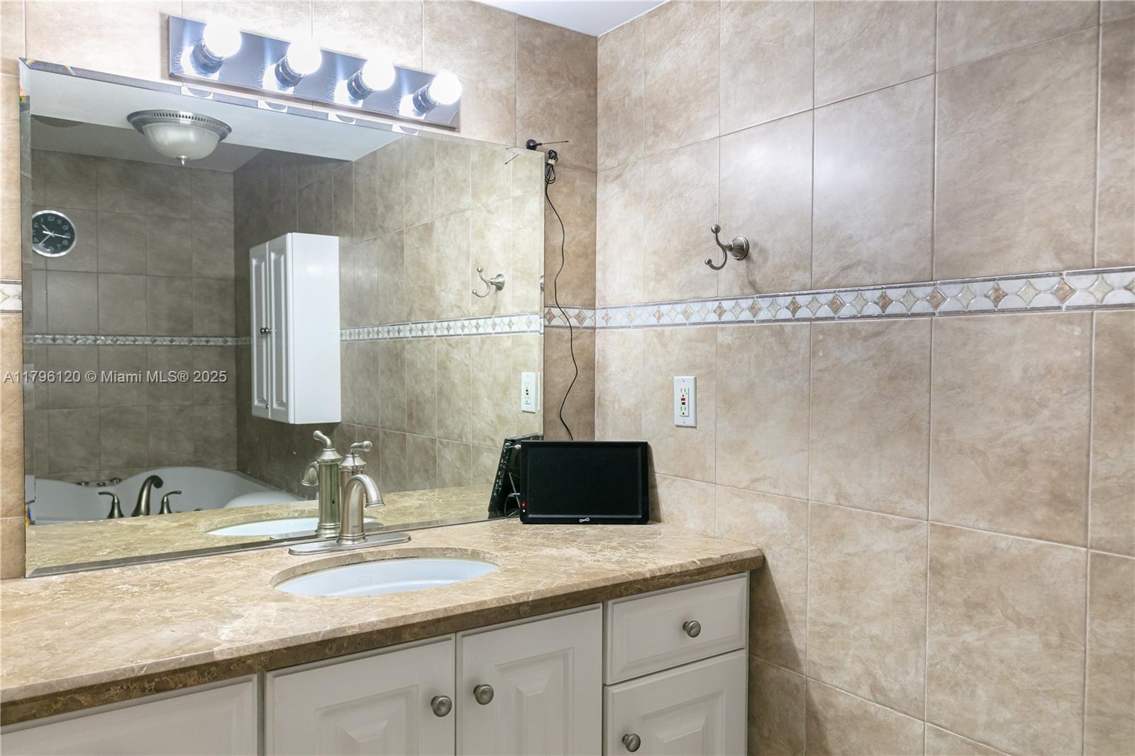 QUADOMAIN TOWER I AND IV - Residential Lease
