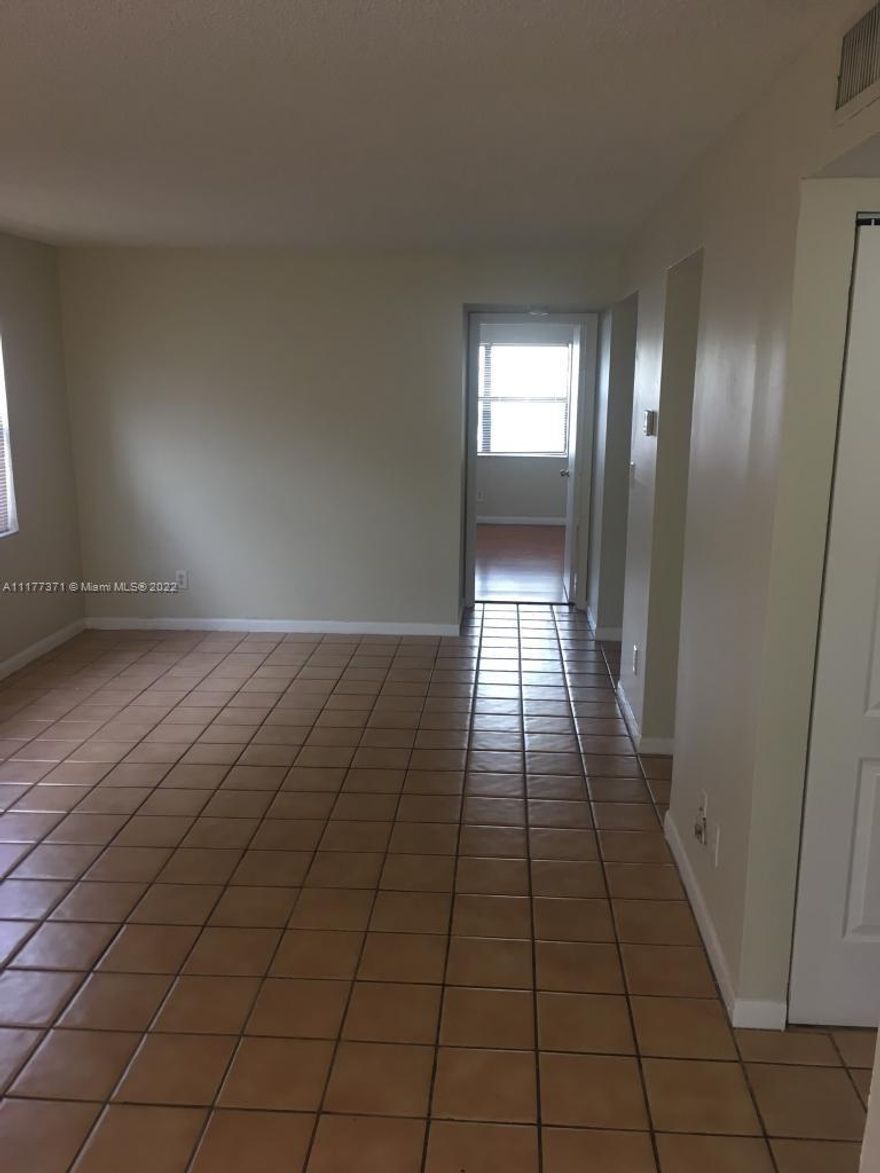 Beautiful 1 bedroom 1.5 bath corner unit Condo in the heart of Miramar. Close to City Hall and Ansin Sport Complex. Very spacious unit with a breakfast area and pass through window. Elevator and trash chute. Washer/dryer inside unit. Hugh patio with storage room great to relax or entertain! You will love this unit! Don't Miss out!! tenant can only show m-f after 6pm