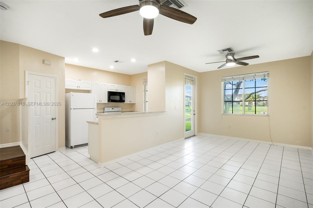 Photo of 6051 SW 19th Pl, North Lauderdale, FL 33068 (MLS # A12007618)
