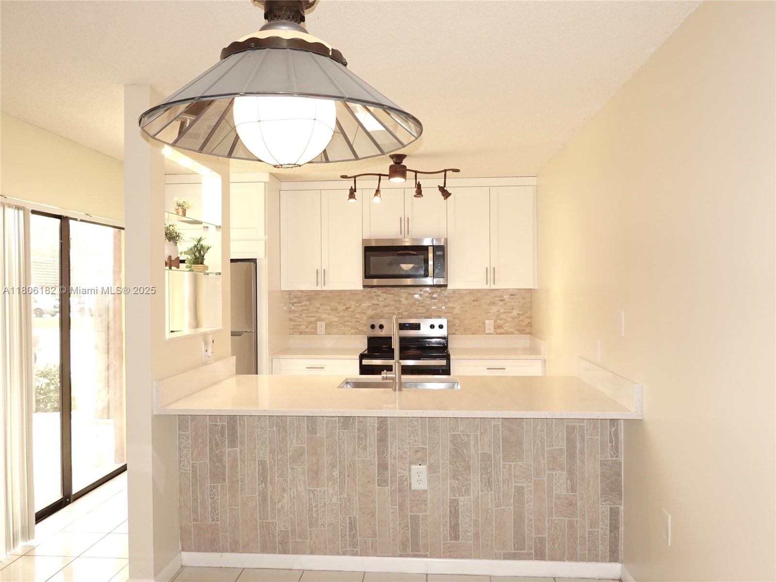 UPDATED TOWNHOUSE! This beautiful townhouse in the Village of Sandalwood is ready for its new owner. Home can be rented immediately. 2 bedrooms, 2.5 bathrooms. This home has tile throughout the first floor and laminated wood in the second floor. Very nice fenced patio perfect with its updated fencing perfect for entertaining. HOA covers roof, water internet, cable, sewer, trash and building insurance. Amenities include several pools, tennis courts, playground, walking/jogging trails and so much more. Community is pet friendly.