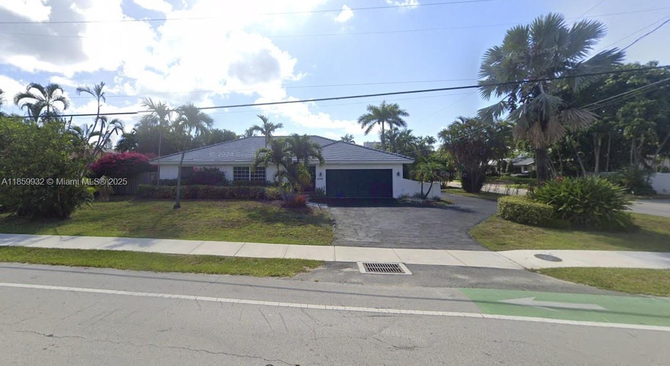 Fort Lauderdale waterfront living at its finest. Beautiful corner residence in Coral Ridge Country Club. This single-family one story home has a spacious 4 bedrooms and 3 bathrooms. This waterfront home spans about 2,460 square feet and sits on an 8,052 Sq Ft lot. It boasts a private dock with direct canal and ocean access and with a spacious ground pool. An open kitchen which flows into an expansive living area where the layout includes a bedroom and breakfast area. This home offers canal and garden views with a two car garage and no HOA. Just steps from Bayview Park, near top-rated schools, and close to the beach and downtown.