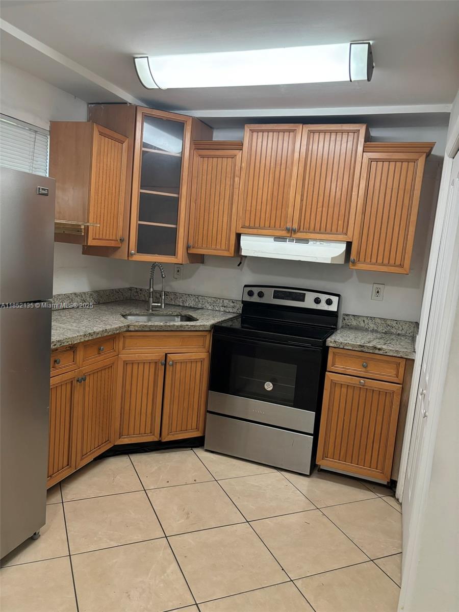 Corner Unit on the first floor. Quiet building in a residential area. 2 bedrooms 1 bathroom. Can be rented immediately. No special assessments. Low maintenance. Easy to show. As Is Sale.