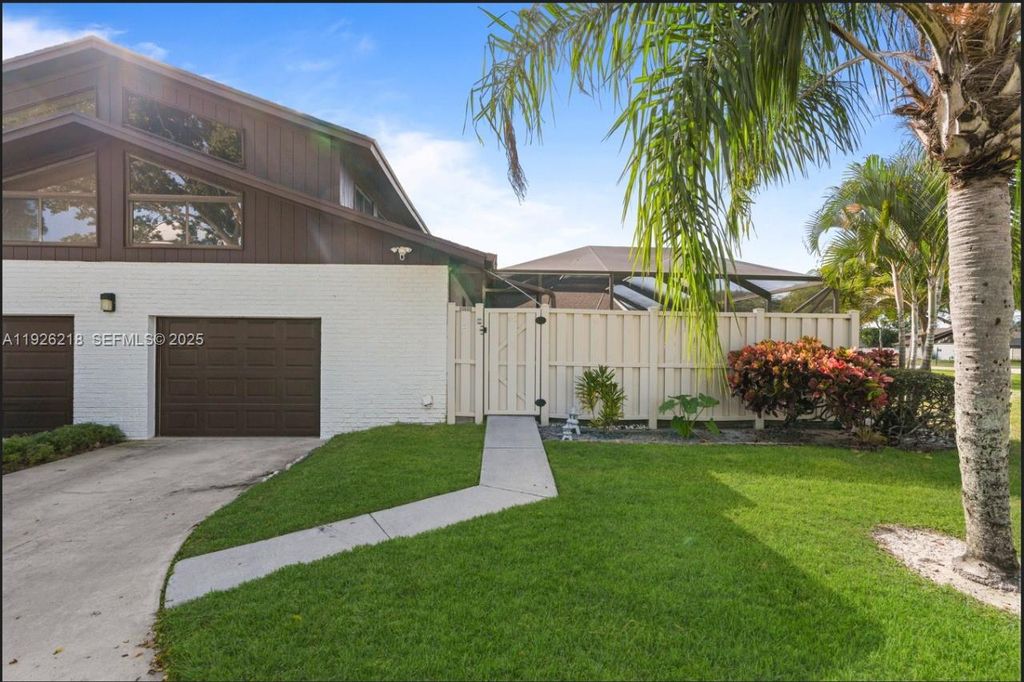 Photo of 9568 Boca Gardens Pkwy #B, Boca Raton, FL 33496 (MLS # A11926218)