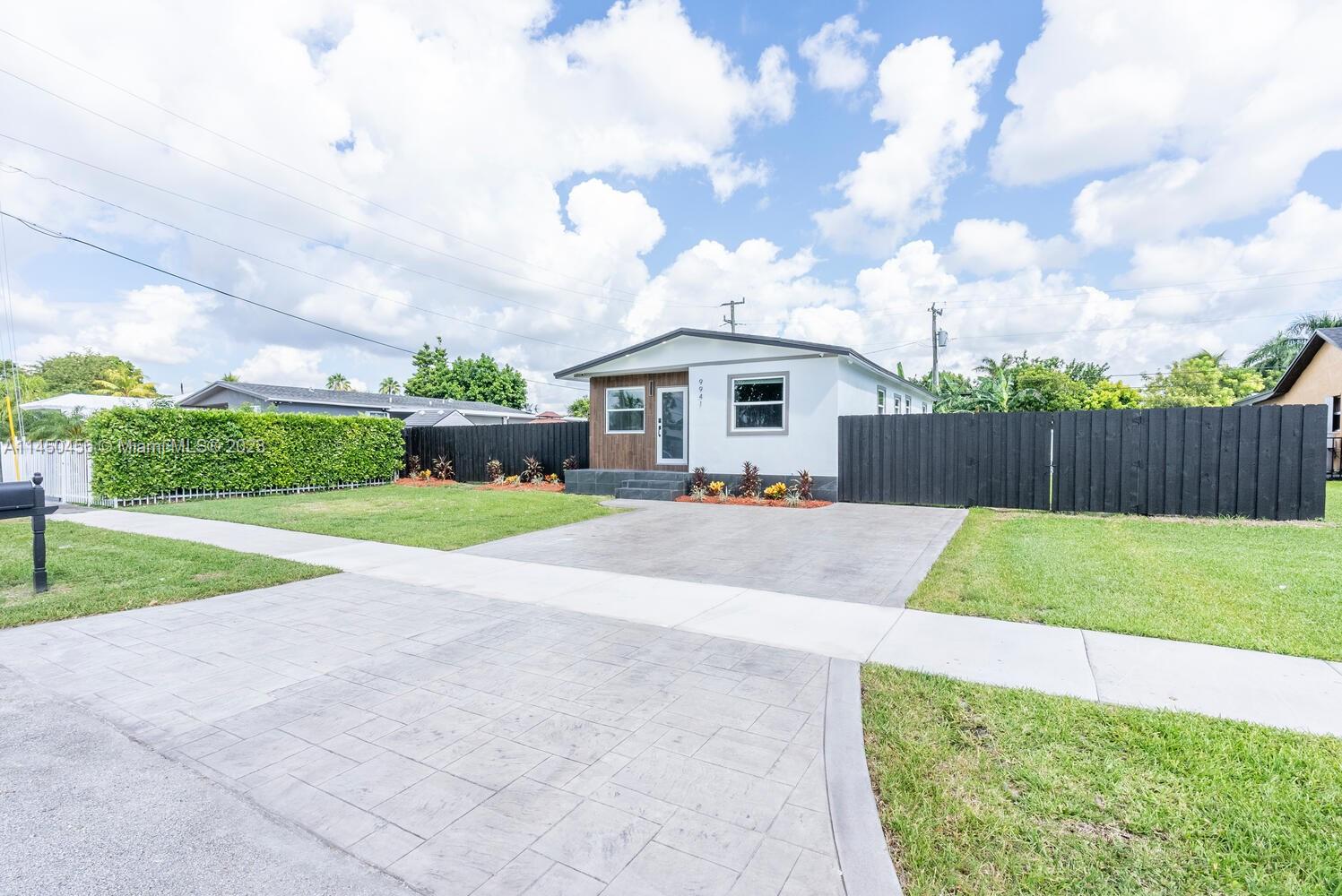 Stunning home available now in Cutler Bay! This property has been tastefully remodeled, and features a spacious layout with plenty of natural light! Three bedrooms and 2 bathrooms! Gorgeous design accents throughout! Brand new kitchen complete with wood cabinets, quartz counter tops, flat top cooking range, and new appliances! Vinyl floor throughout the home, and impact windows! Beautiful living space complete with fireplace! New Roof, New A/C! Big backyard with plenty of space for a pool, and room for boat or RV parking! This one will not last, make your appointment today!