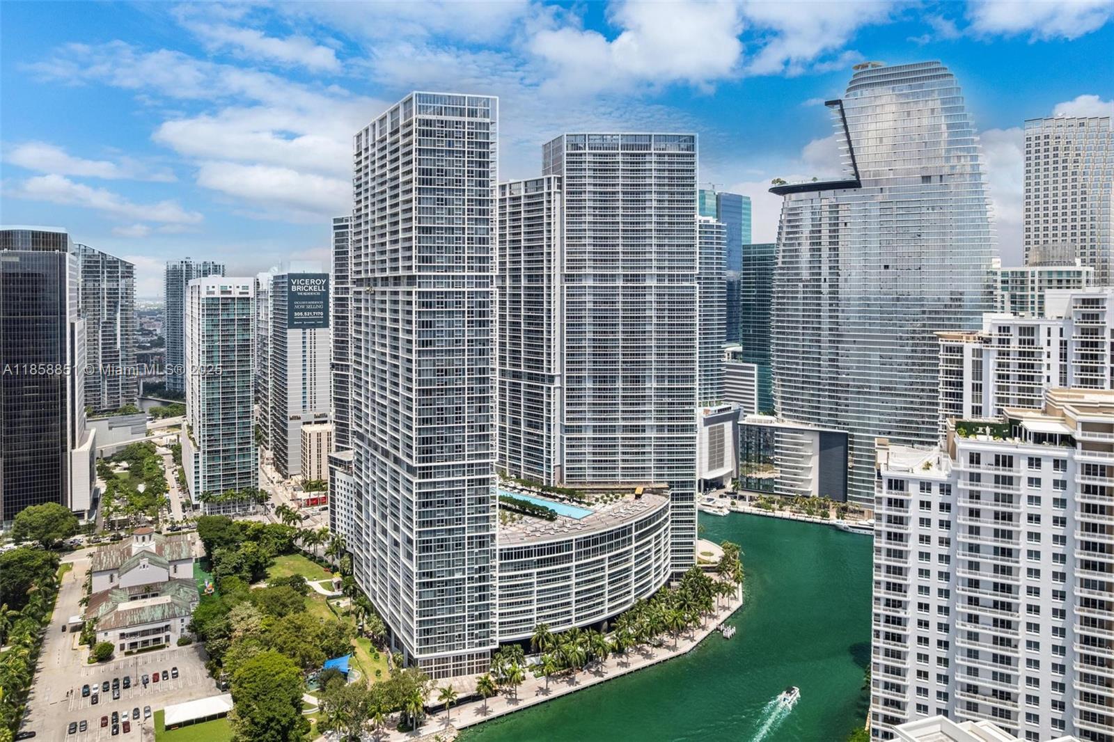 Experience elevated urban living in this stunning 2 bedroom, 2 bathroom condo located in the iconic Icon Brickell Tower 2. This spacious residence features floor-to-ceiling windows, sleek marble flooring, an open-concept kitchen with premium appliances, and a private balcony with serene views of the city, park and bay. Enjoy world-class amenities including an expansive spa, Olympic-sized pool, state-of-the-art fitness center, concierge, and valet service. Nestled in the heart of Brickell, you're just steps from Brickell City Centre, top restaurants, and vibrant nightlife. Luxury, convenience, and style await.