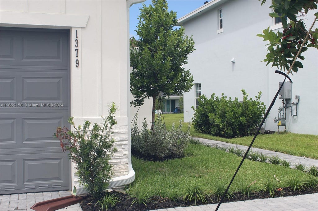 Photo of 1379 Tangled Orchard Trce #0119, Loxahatchee, FL 33470 (MLS # A11652158)