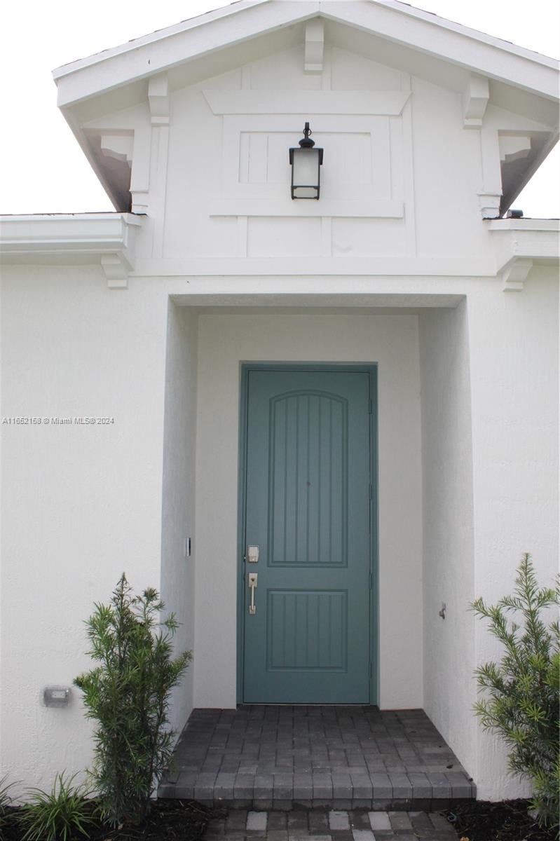 Photo of 1379 Tangled Orchard Trce #0119, Loxahatchee, FL 33470 (MLS # A11652158)