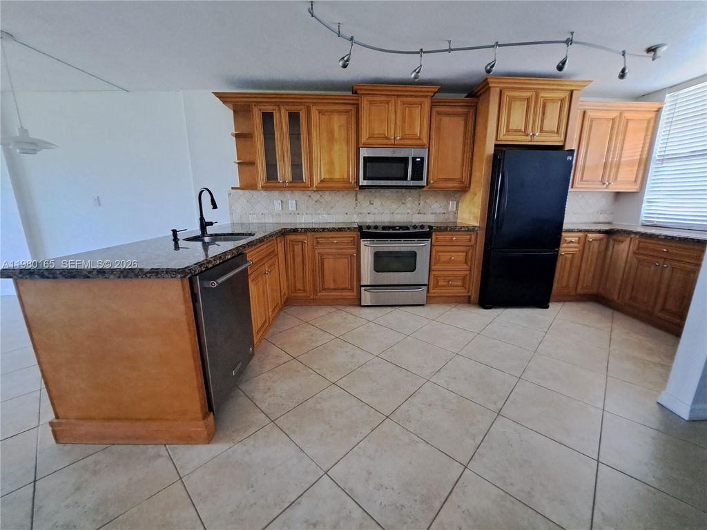 Photo of 250 Jacaranda Dr #109, Plantation, FL 33324 (MLS # A11980165)