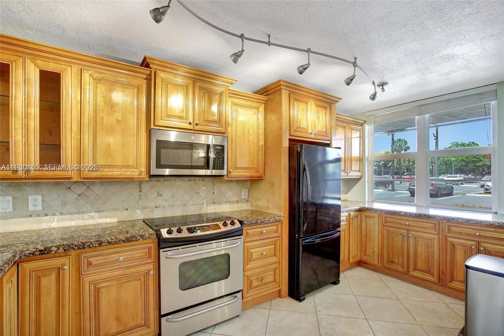 Photo of 250 Jacaranda Dr #109, Plantation, FL 33324 (MLS # A11980165)